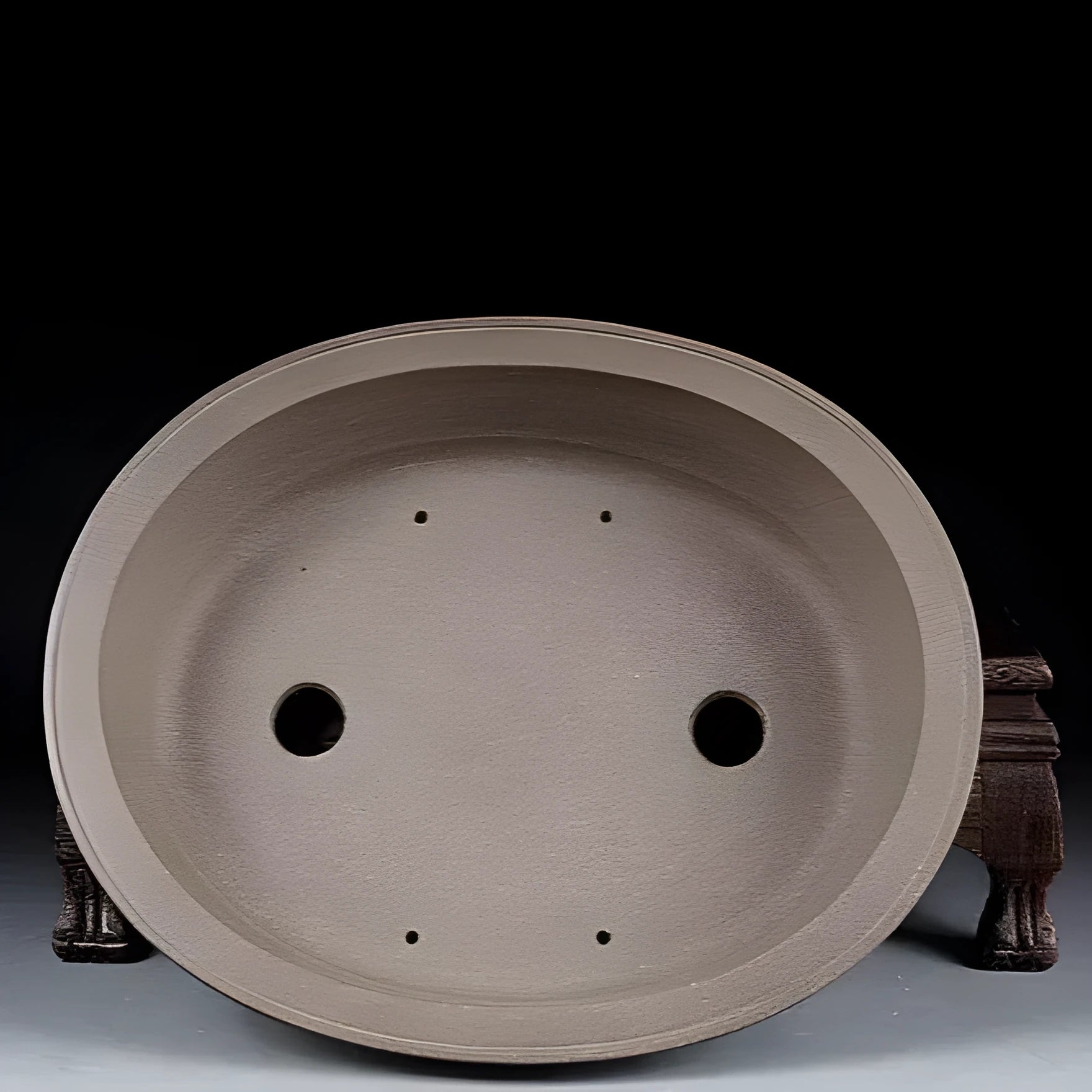 Handmade antique oval bonsai flower pot in purple sand clay, showing dimensions 25cm by 21cm.