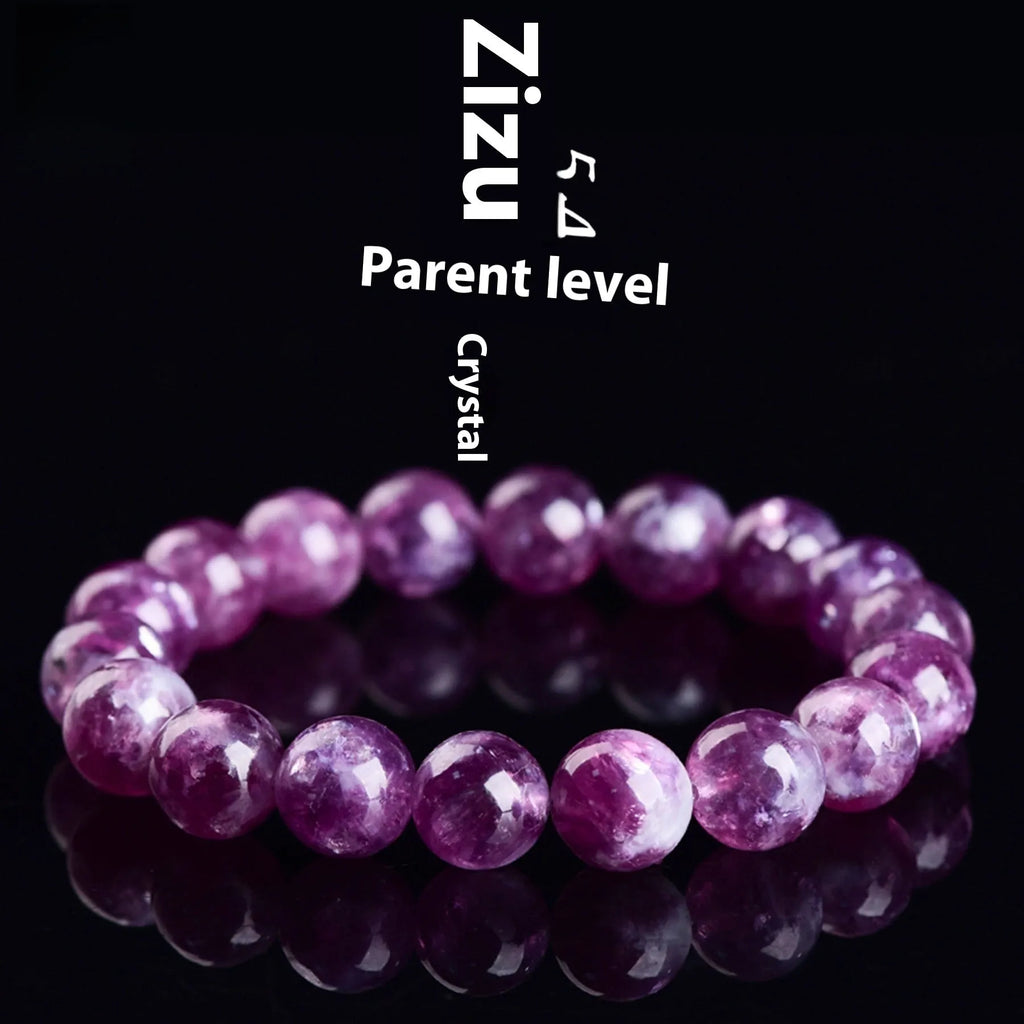 Purple polished crystal beaded bracelet with geometric beads on a white background.