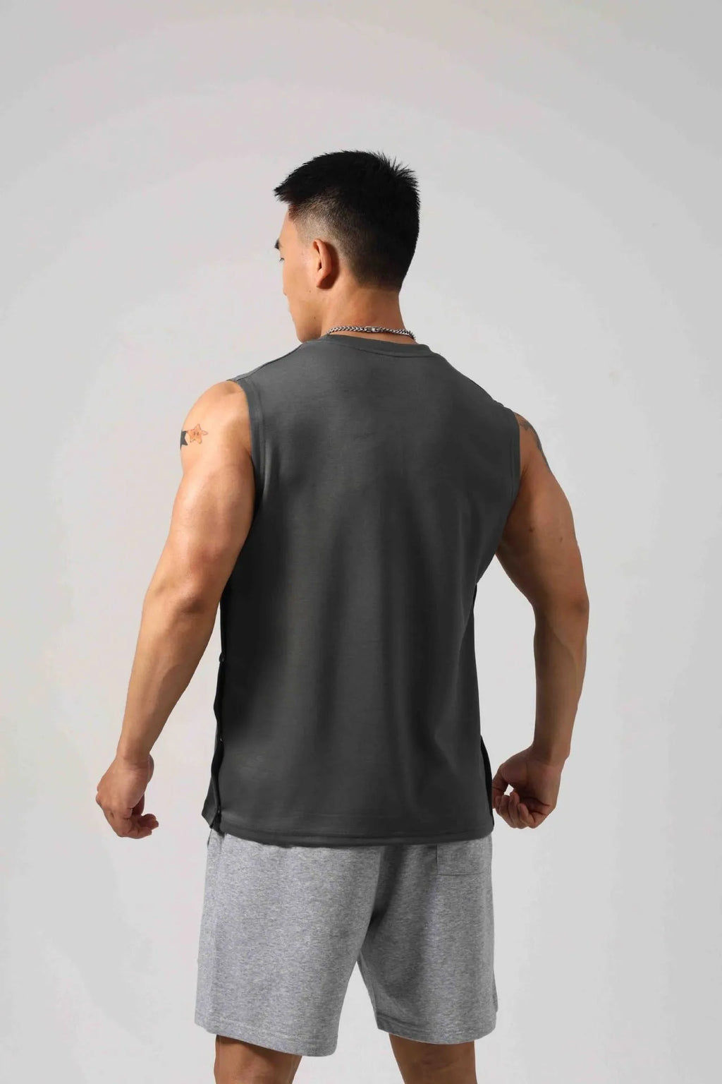 Korean style loose cotton fitness vest with hidden hook side openings in solid colour