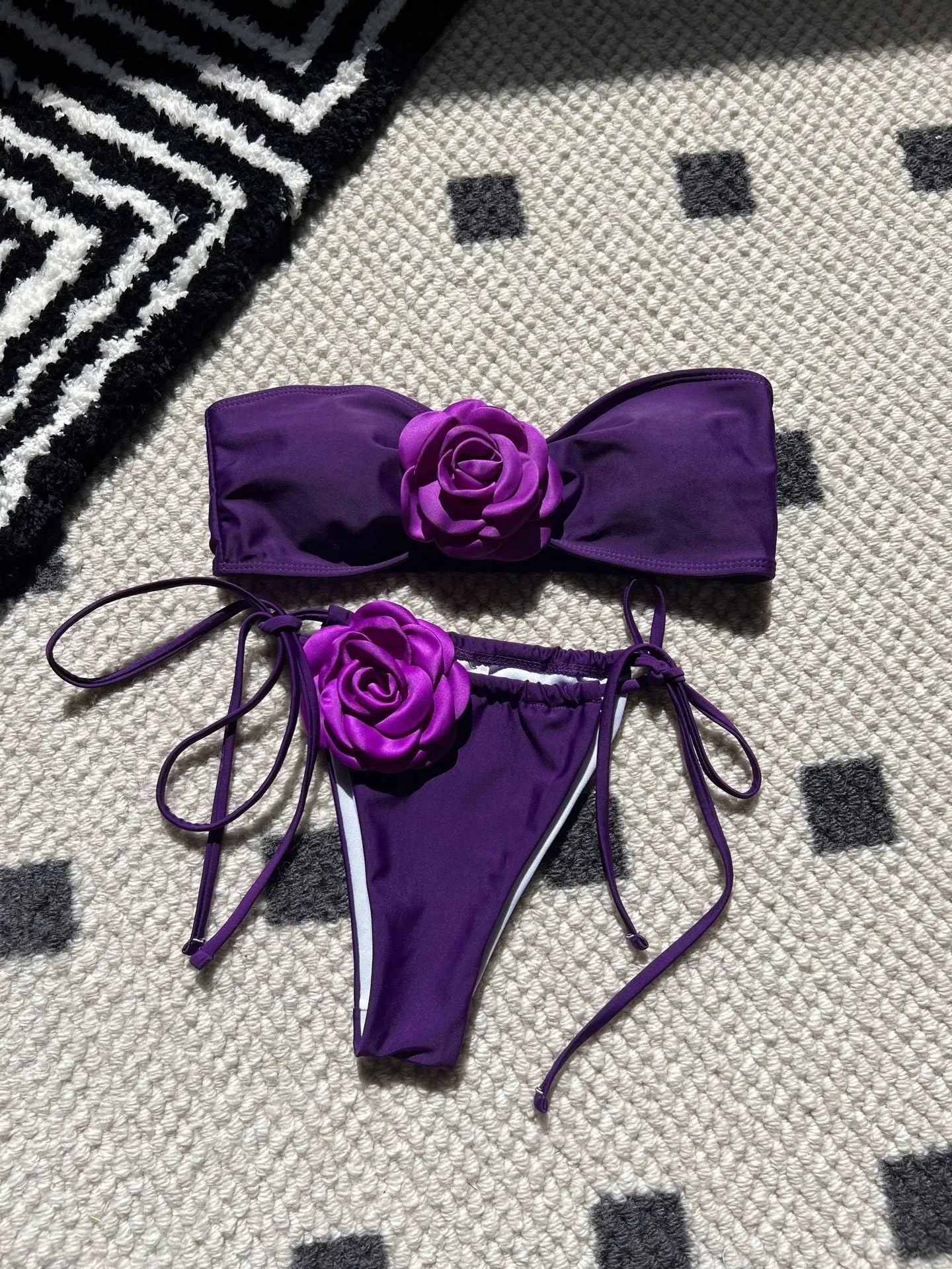 Solid colour rose tube top one-piece swimsuit for women with an adjustable drawstring strap and split style briefs.