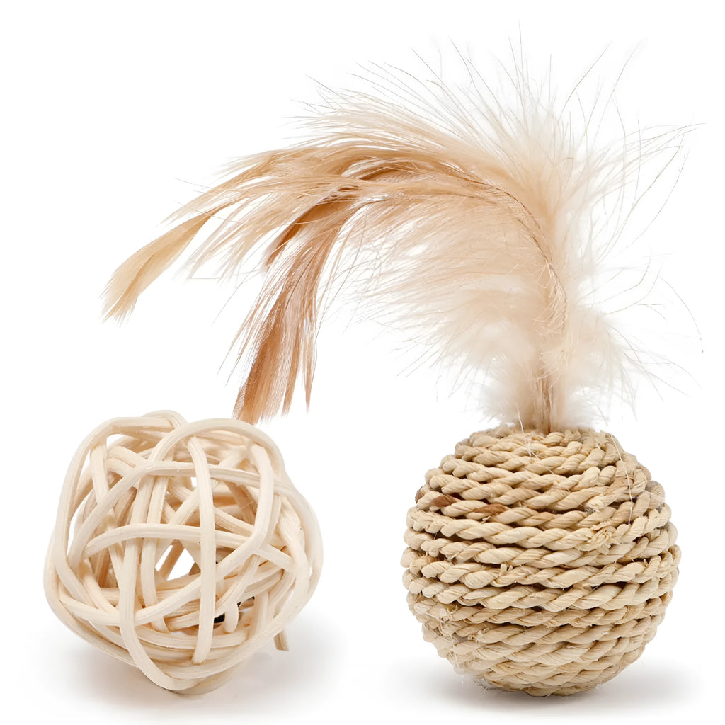 Two cat toy balls: hollow rattan sphere and faux feather ball with bell
