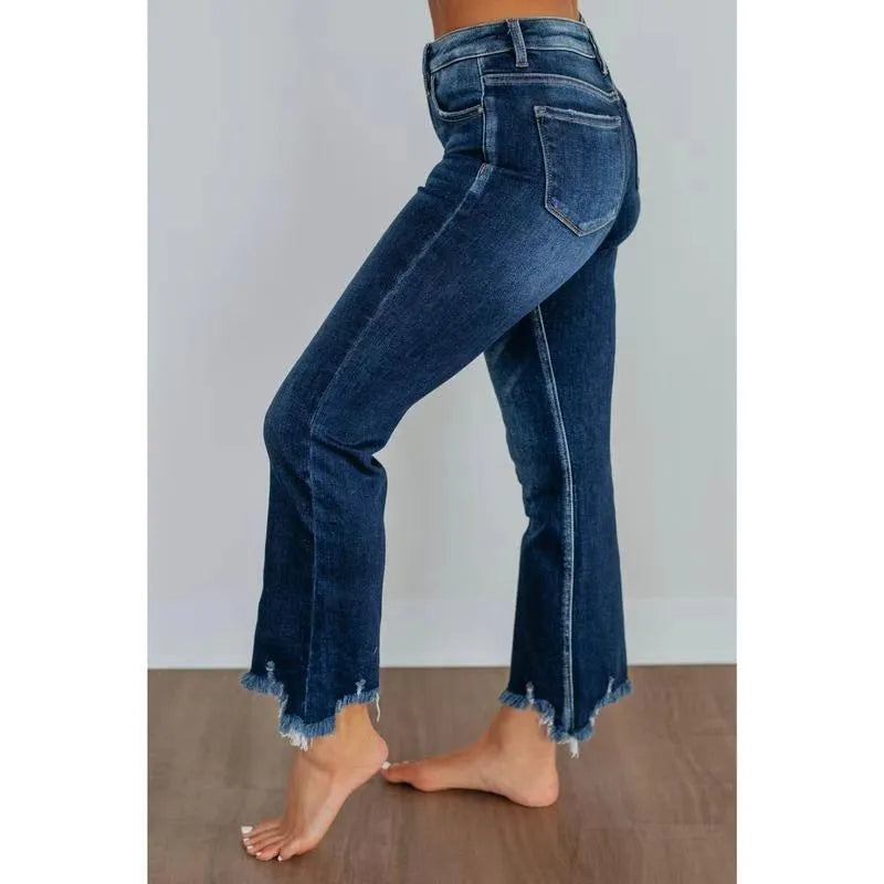 Women's dark blue cotton denim trousers with hand-worn finish, casual style