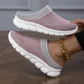 Women's black Flyknit casual shoes with striped pattern, hollowed-out design, and sewing lines on a lightweight sole.