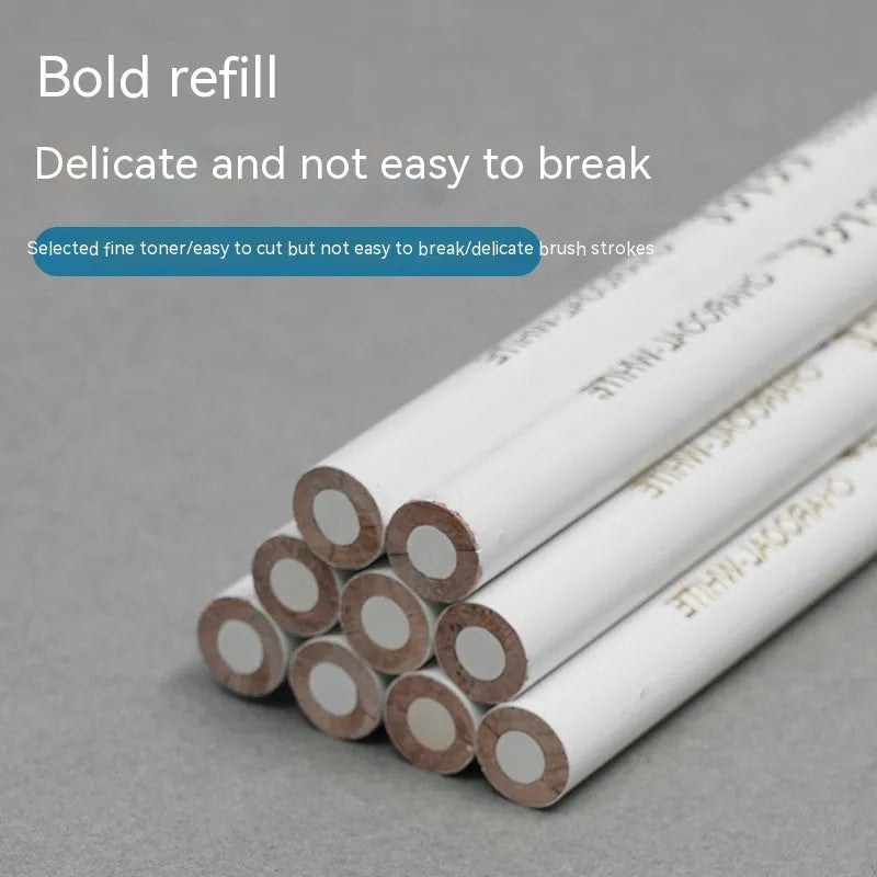 Three white charcoal sketching pencils with wooden barrels for highlighting artwork