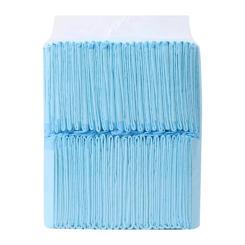 Pack of white pet urinal pads with blue trim, shown alongside a tape measure indicating the 45x60cm M size dimensions.