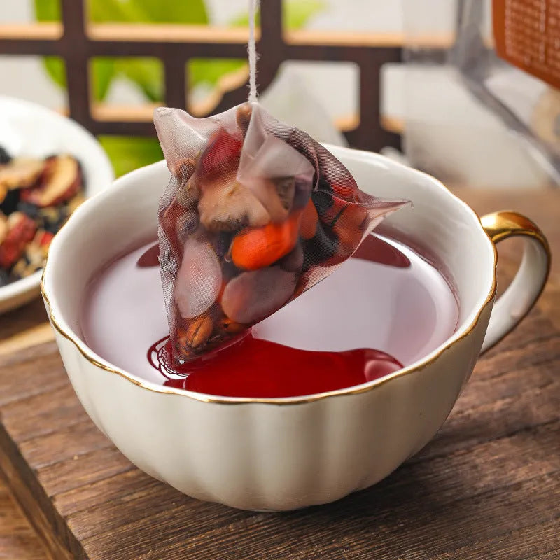 Bag of Ginseng Black Wolfberry Tea containing 40 individual 5g tea sachets, total 200g.