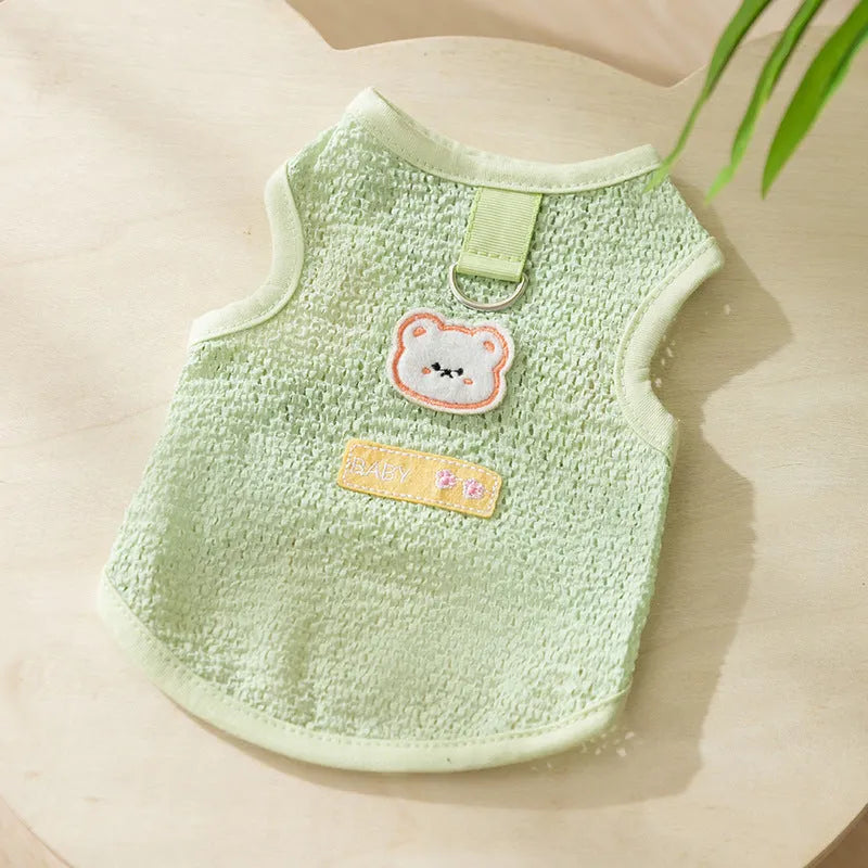 Green knitted cat top with hollowed-out design and a bear cartoon patch on the side
