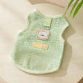 Green knitted cat top with hollowed-out design and a bear cartoon patch on the side