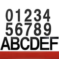 Black stainless steel house number with adhesive backing showing 7.5cm character size