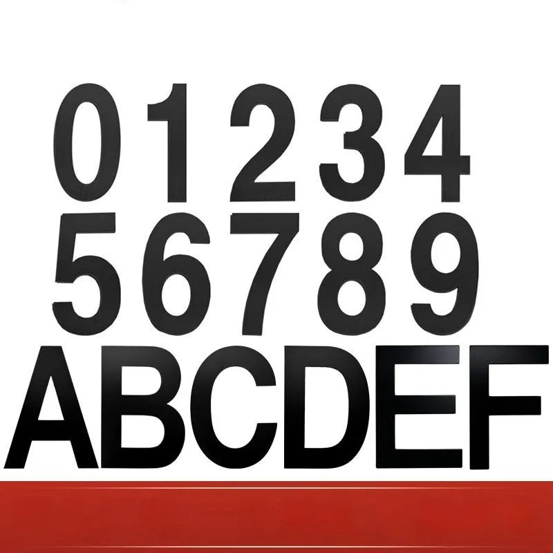 Black stainless steel house number with adhesive backing showing 7.5cm character size