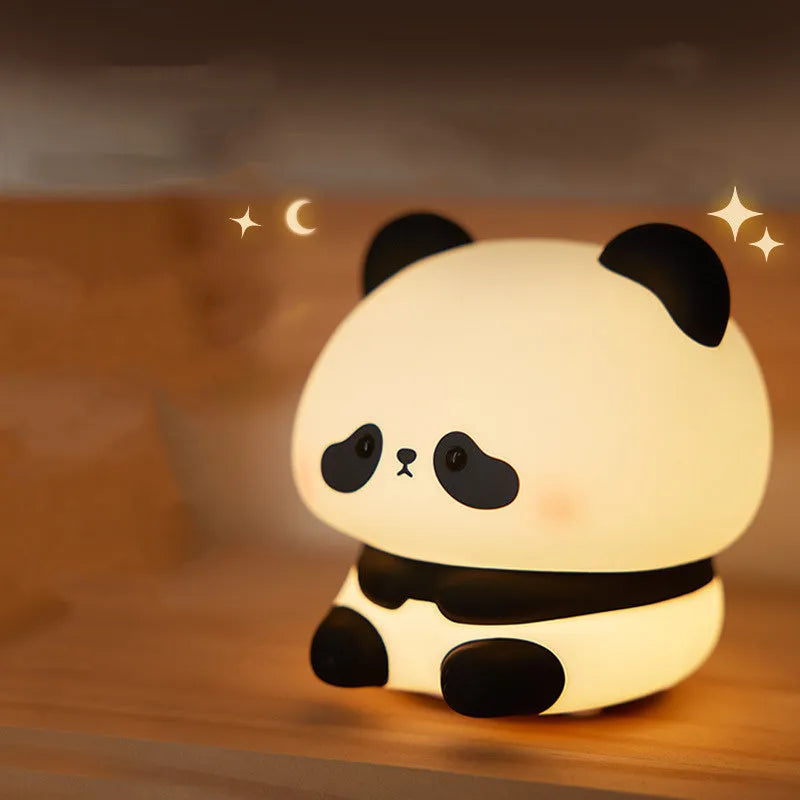 Rechargeable panda-shaped night light with warm white LED illumination and silicone construction