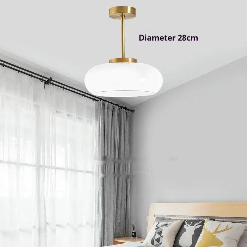 Bauhaus pendant light with three milk white egg tart shaped glass shades