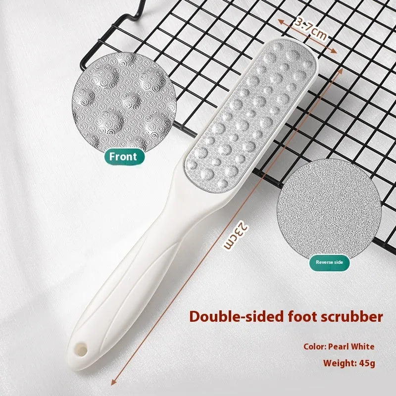 Stainless steel double-sided foot grinder with black and white tools for callus removal