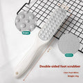 Stainless steel double-sided foot grinder with black and white tools for callus removal