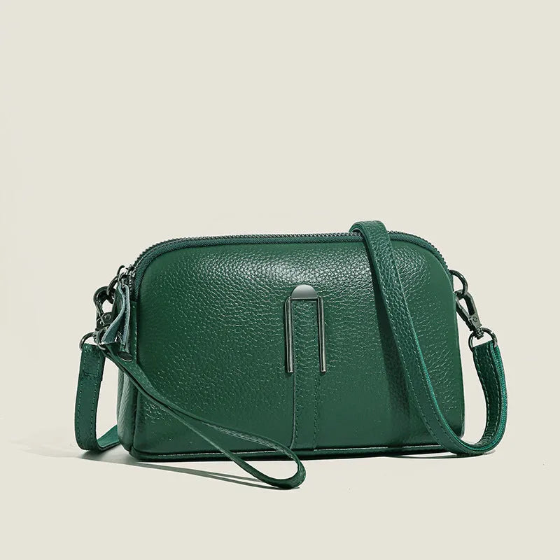 Genuine leather women's square shoulder bag in dark green, showing its horizontal 19x13x6cm shape.