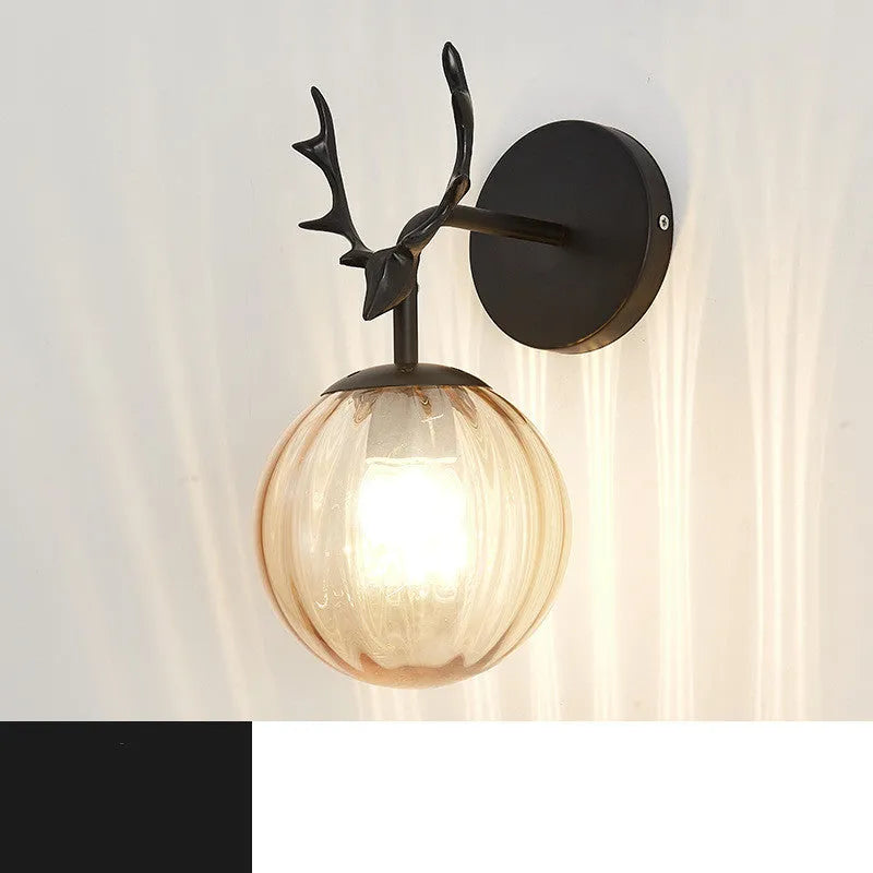 Minimalist round Nordic style glass wall lamp on a white wall