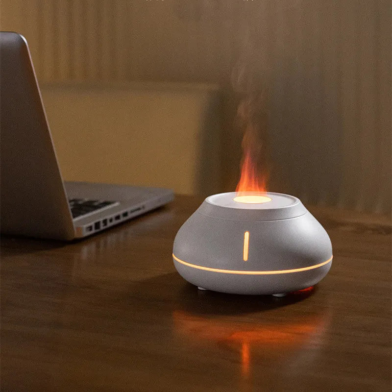 Desktop aroma diffuser with colourful simulation flame effect and LED light in white finish