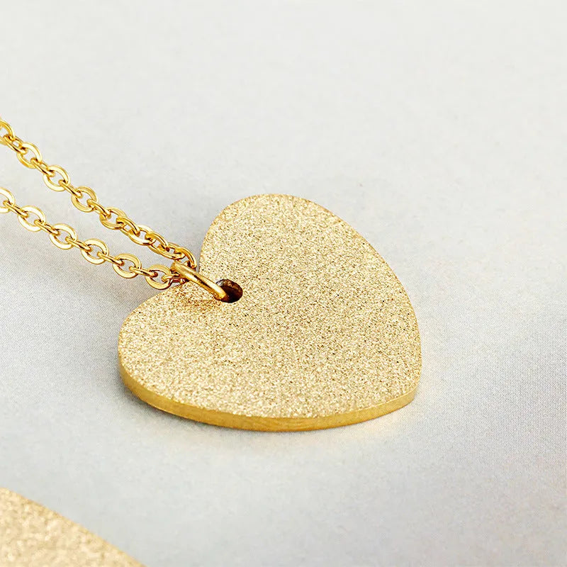 Geometric heart-shaped titanium steel pendant necklace on a chain