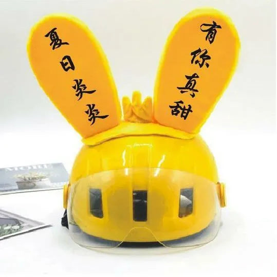 Rabbit Glow Ears helmet ornament with Velcro bottom in multiple colour options including blue, yellow, red, and purple.