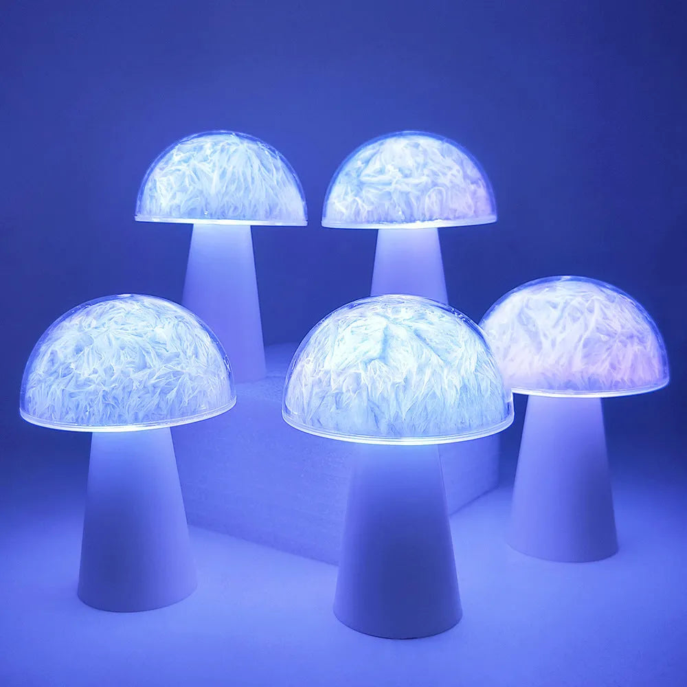 Mushroom-shaped remote control night light with RGB colour changing on wooden surface