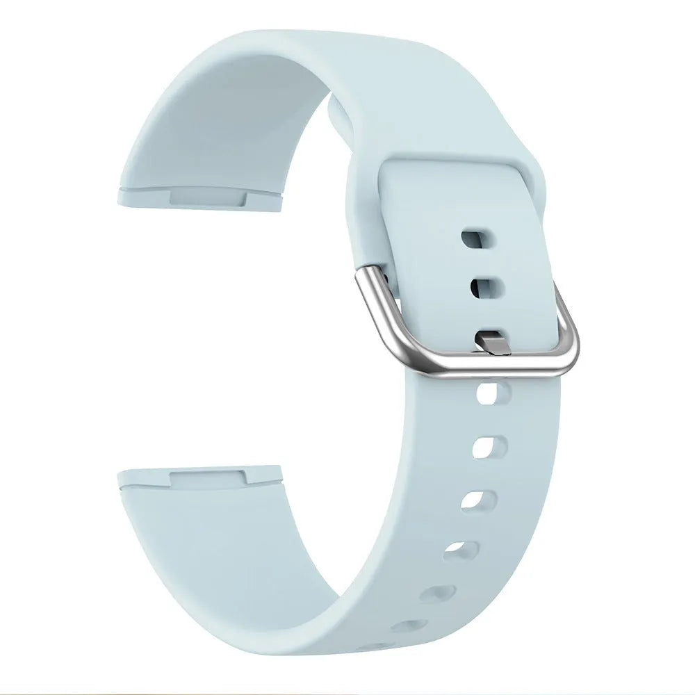Solid colour silicone replacement strap with silver buckle for Fitbit Versa 3 and Sense 2 fitness trackers.