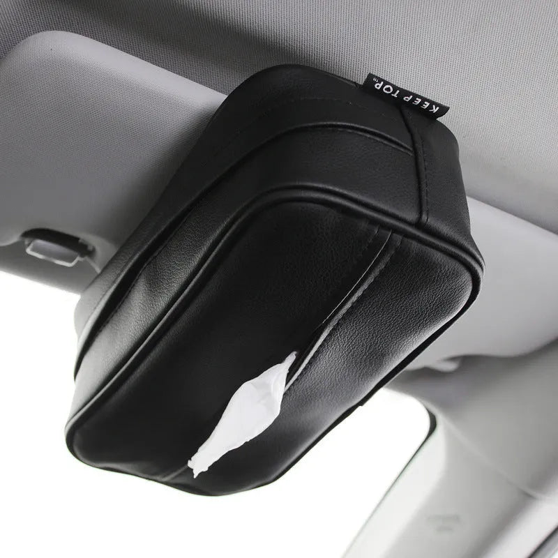Black PU leather hanging storage box for paper bags, shown suspended, with dimensions 23x13x9cm.