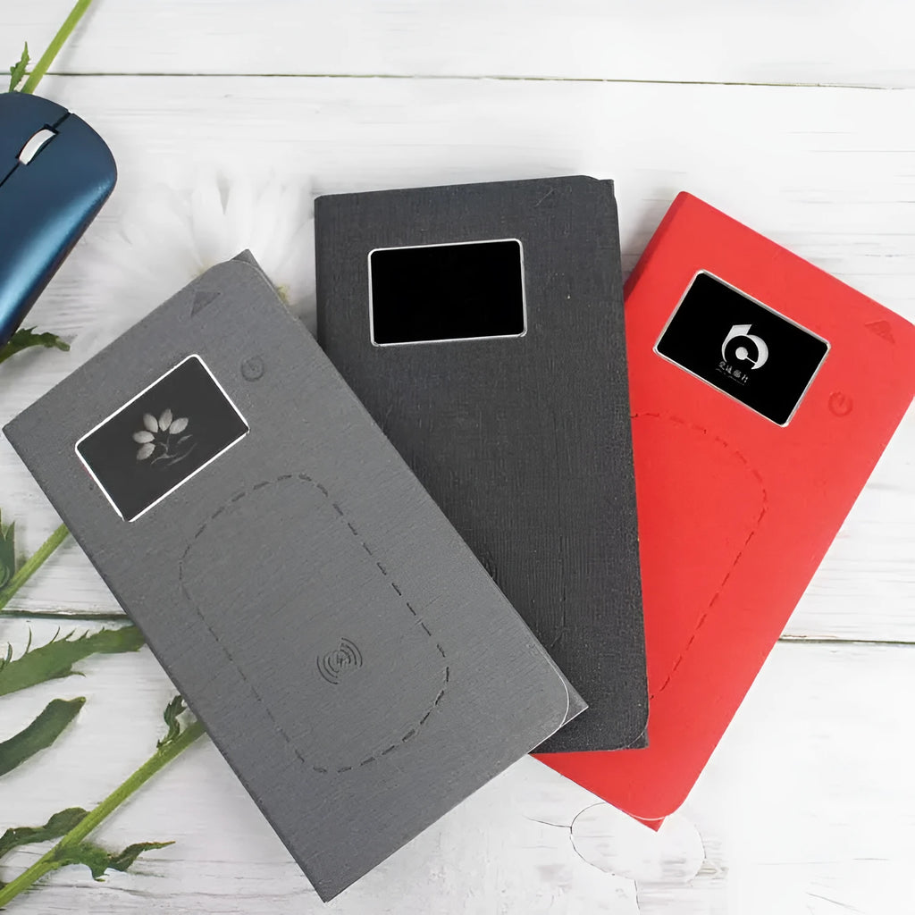Folding wireless charging mouse pad set with Bluetooth mouse on desk, showing compact folded size