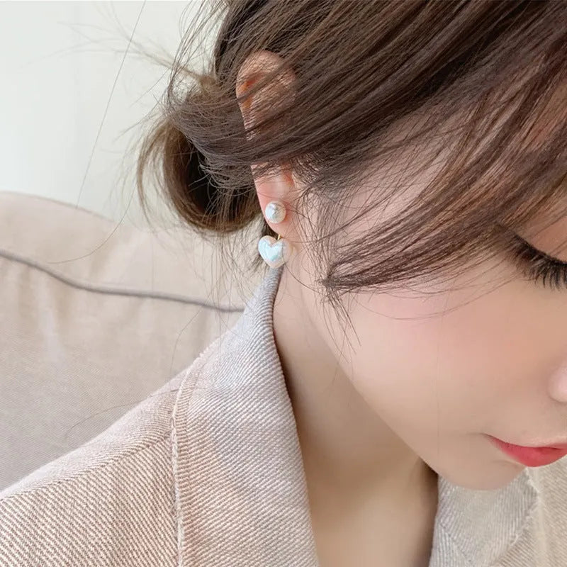 Women's heart-shaped pearl stud earrings with Korean style design and alloy electroplated finish