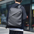 Large capacity waterproof backpack in black blue or grey colours made from PU leather with simple design