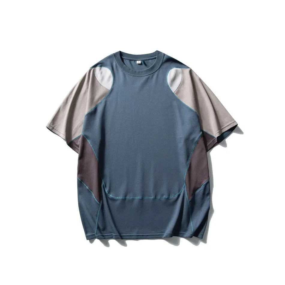 Men's patchwork contrast colour loose-fit sports T-shirt with raglan short sleeves.
