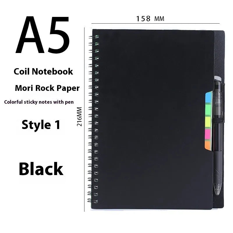Reusable erasable coil notebook with stone paper, shown with a pen and available in multiple cover colour options.