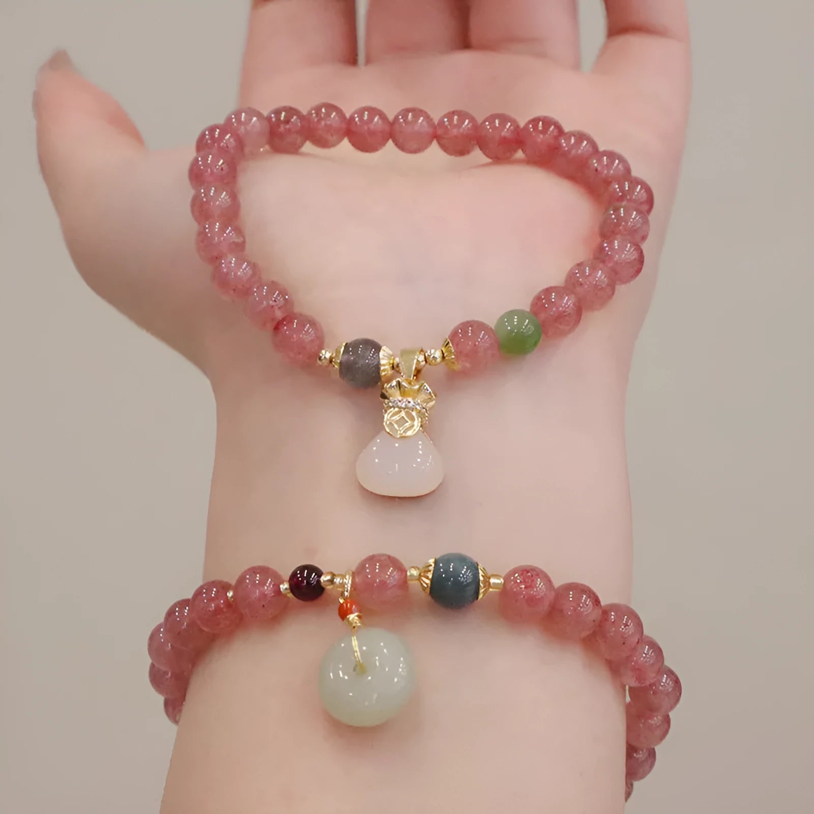 Strawberry quartz women's bracelet with geometric design, peace buckle charm and safety buckle closure