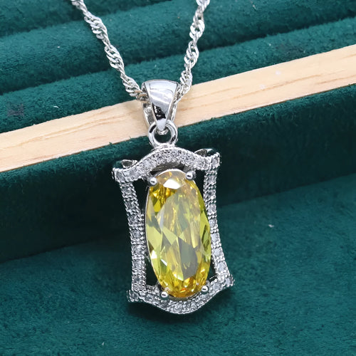 Olive and yellow anti-allergy alloy zircon jewellery set showing necklace, earrings, ring, and bracelet on a display.