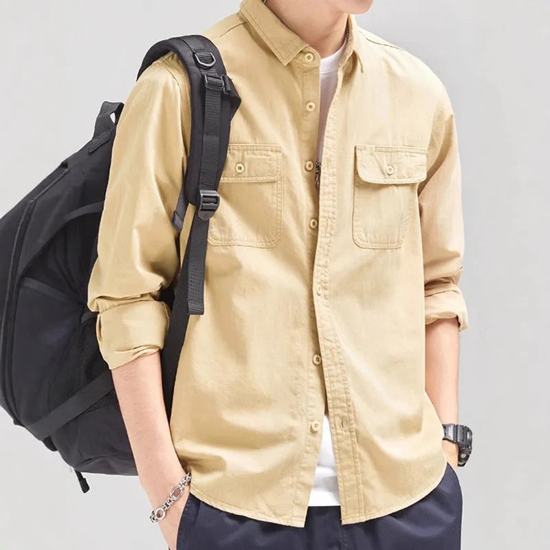 Men's light grey loose fit cardigan-style shirt with an overalls design and long sleeves.