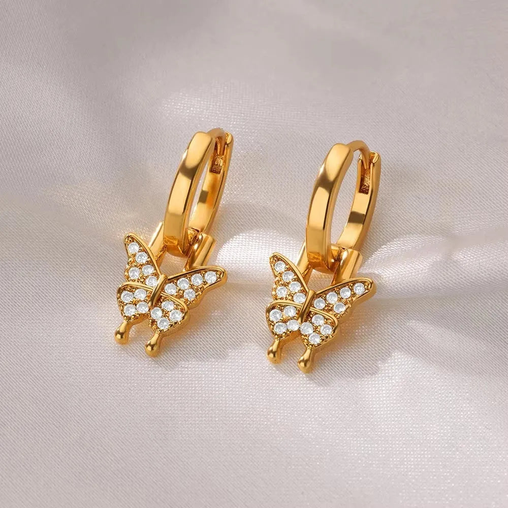 Women's geometric butterfly earrings with heart, bow and star shapes in copper with diamond finish