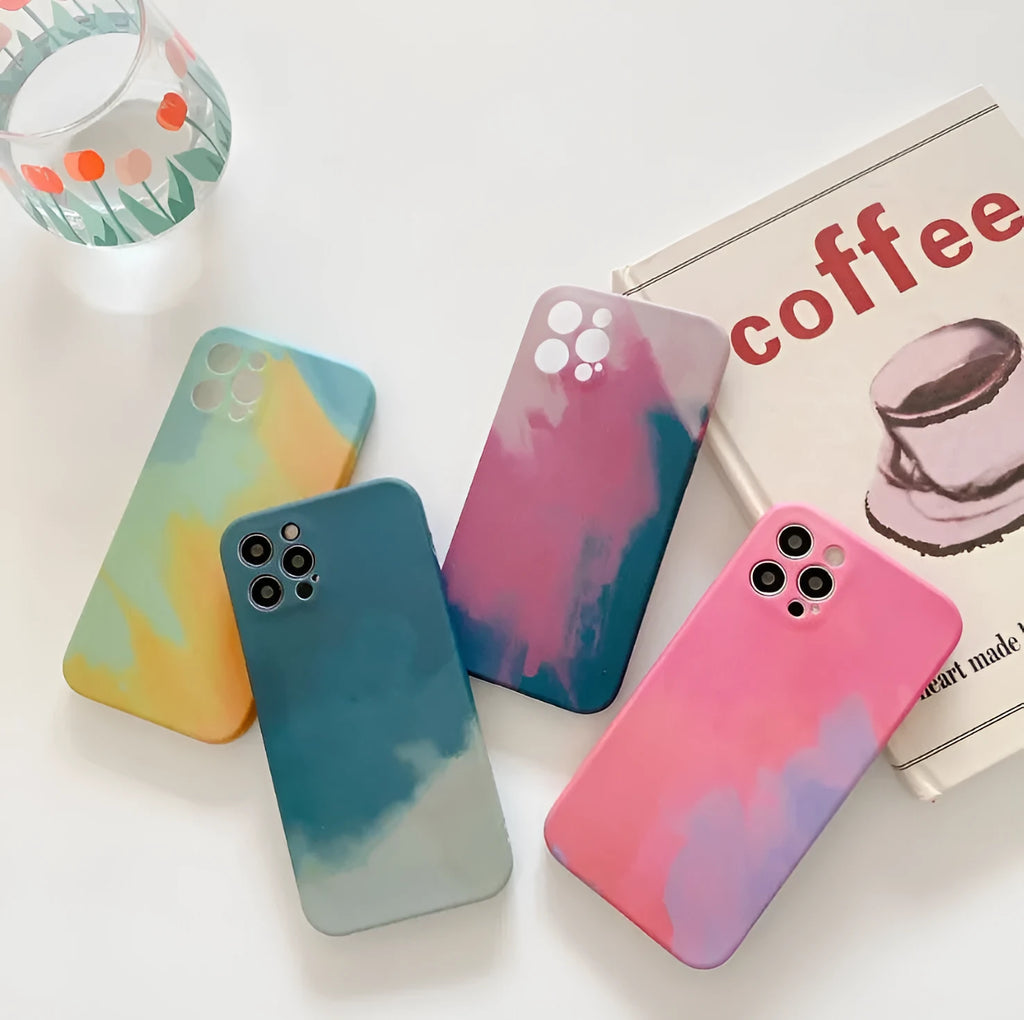 Soft silicone iPhone case with blue and purple oil painting gradient and white geometric abstract pattern.