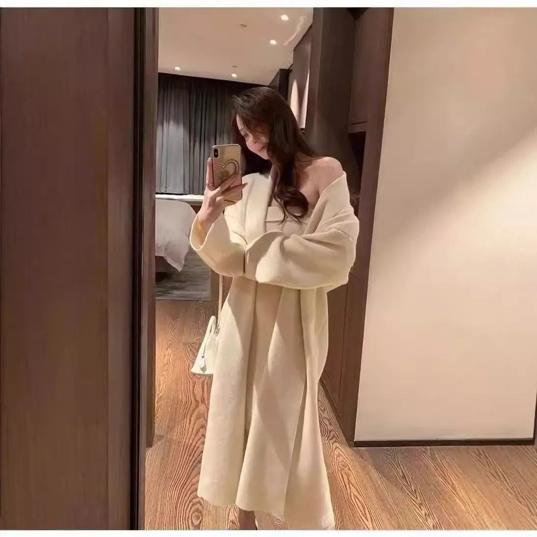Women's grey knitted cardigan dress and coat suit set with flocking pattern detail.