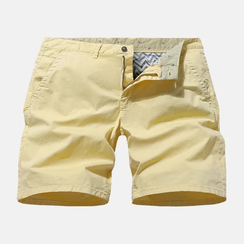 Men's straight-fit denim shorts in blue, shown on a hanger.