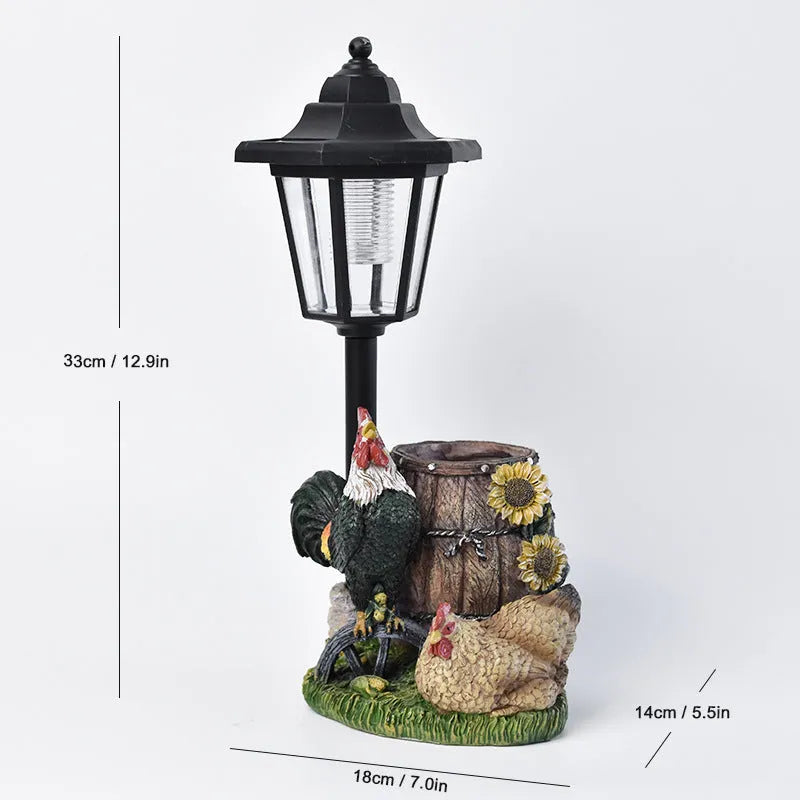 Solar hexagonal garden lamp with decorative resin figurine on plastic base for outdoor pathway lighting