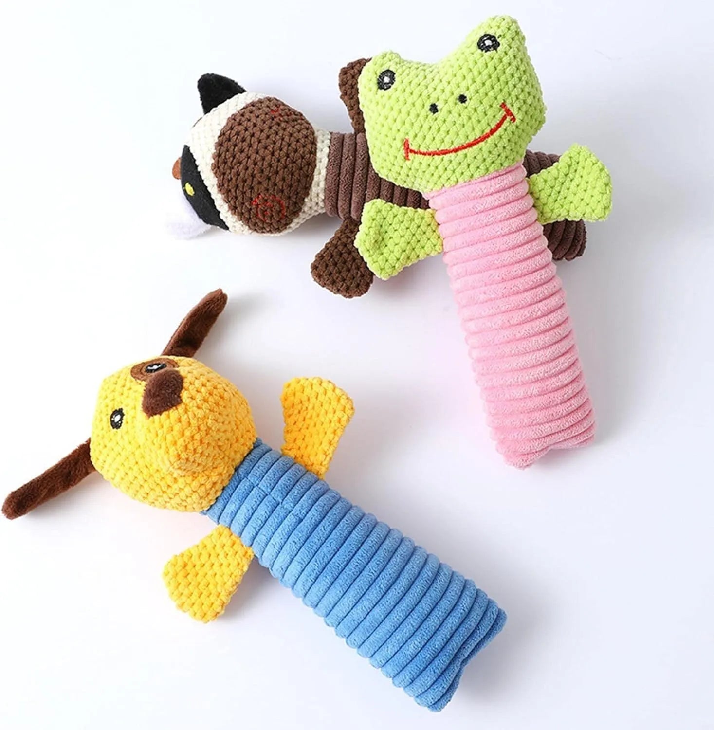 Soft plush squeaky dog chew toy in animal shape for dental care and play.