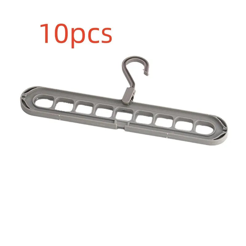 Plastic nine-hole folding pant hanger in multiple colours for dormitory wardrobe organisation