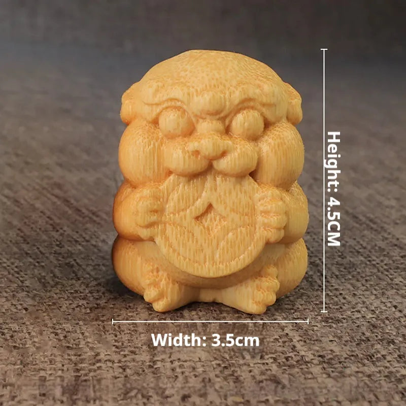 Solid bamboo Take Money carving ornament on a surface, showing natural grain and carved symbol.