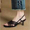 Women's light brown retro ankle-strap sandals with thin cross straps and a square toe on a mid heel.