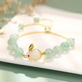 Rabbit charm bracelet with green aventurine or strawberry quartz stones on gold-plated copper