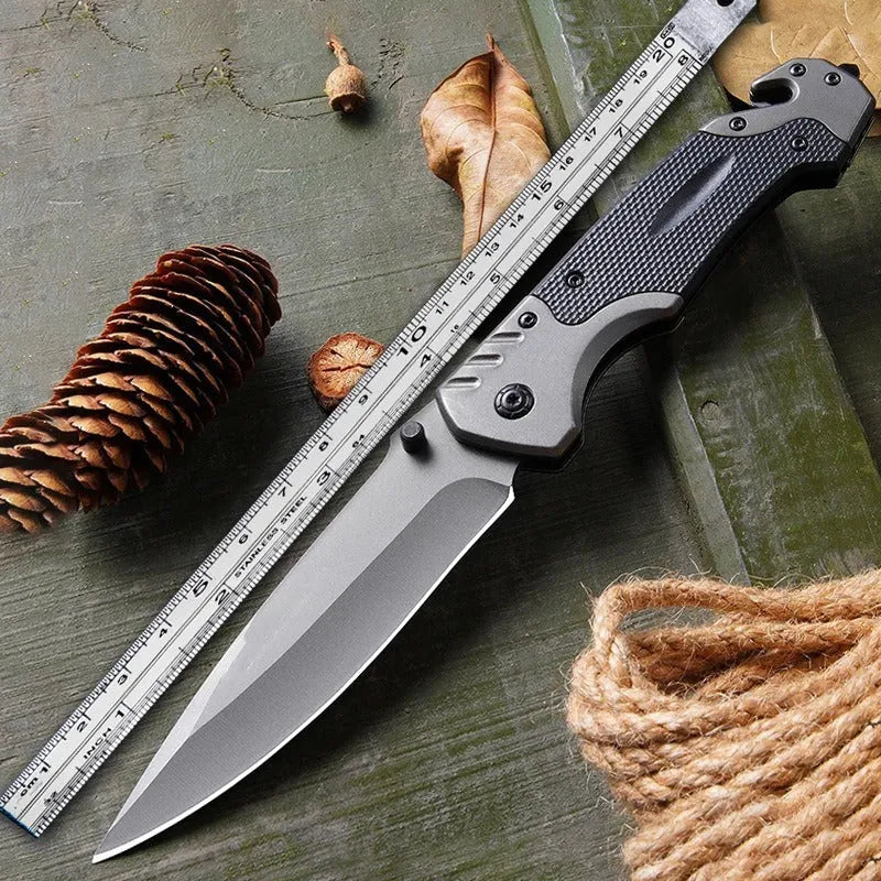 Alloy folding knife with blade extended showing 60-degree tip angle and 115mm handle