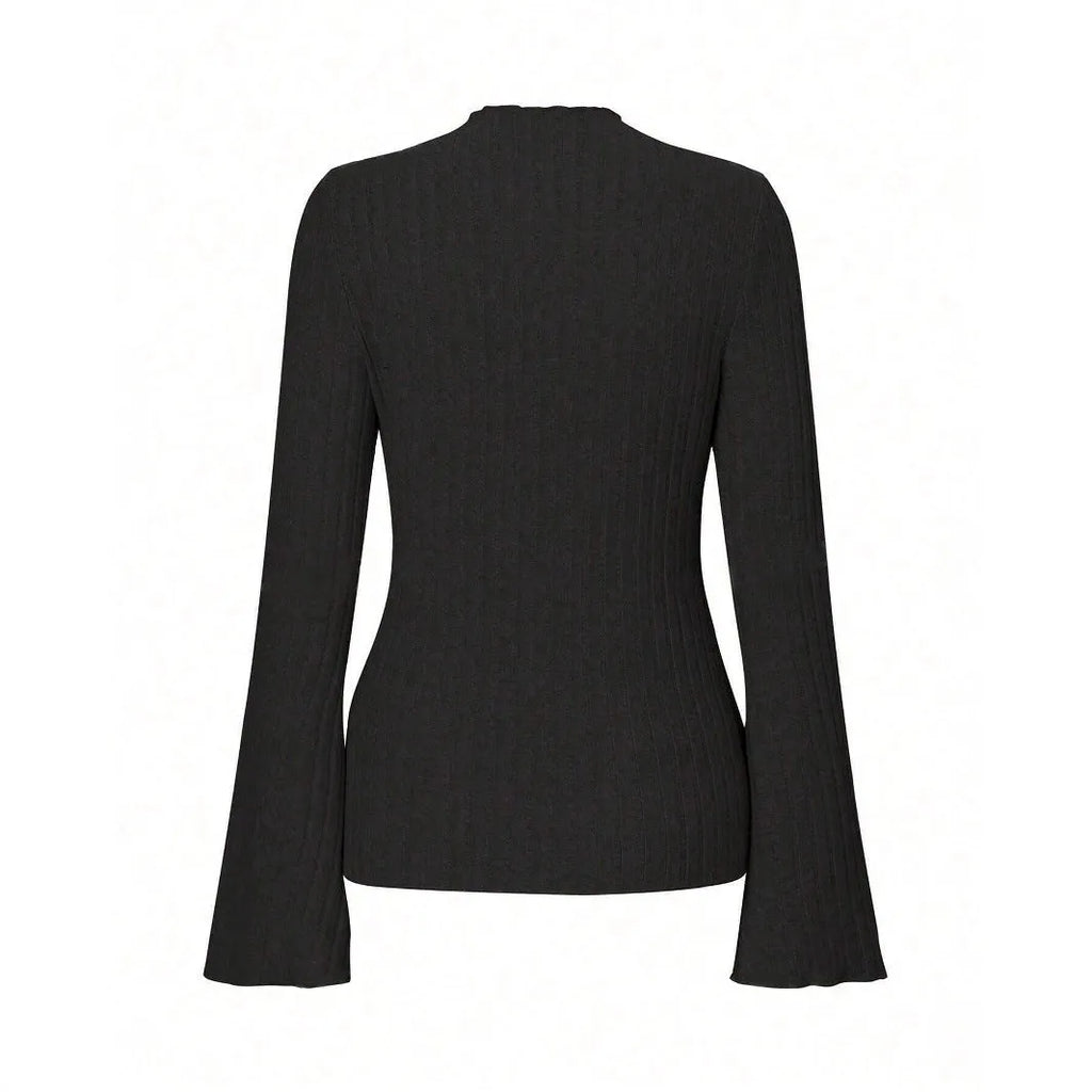 Man wearing black brushed polyester slim fit long sleeve top with sunken stripe design and round neck