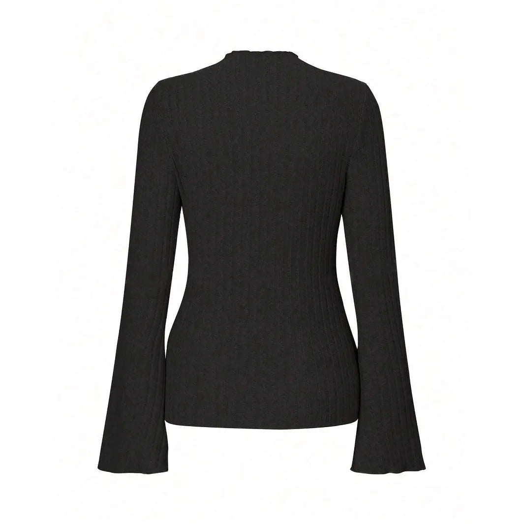 Man wearing black brushed polyester slim fit long sleeve top with sunken stripe design and round neck