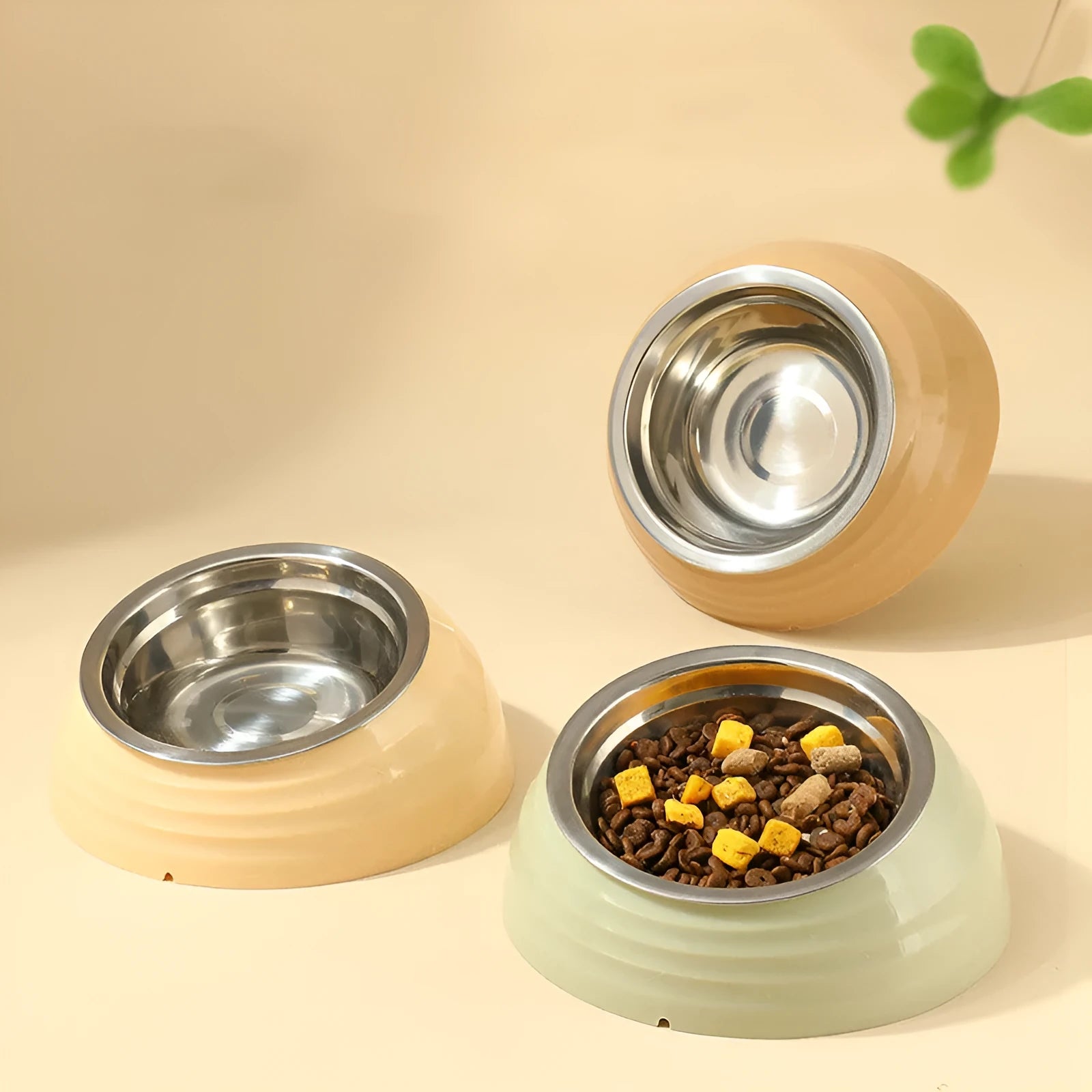 Stainless steel cat bowl on plastic stand in beige, green or brown colour