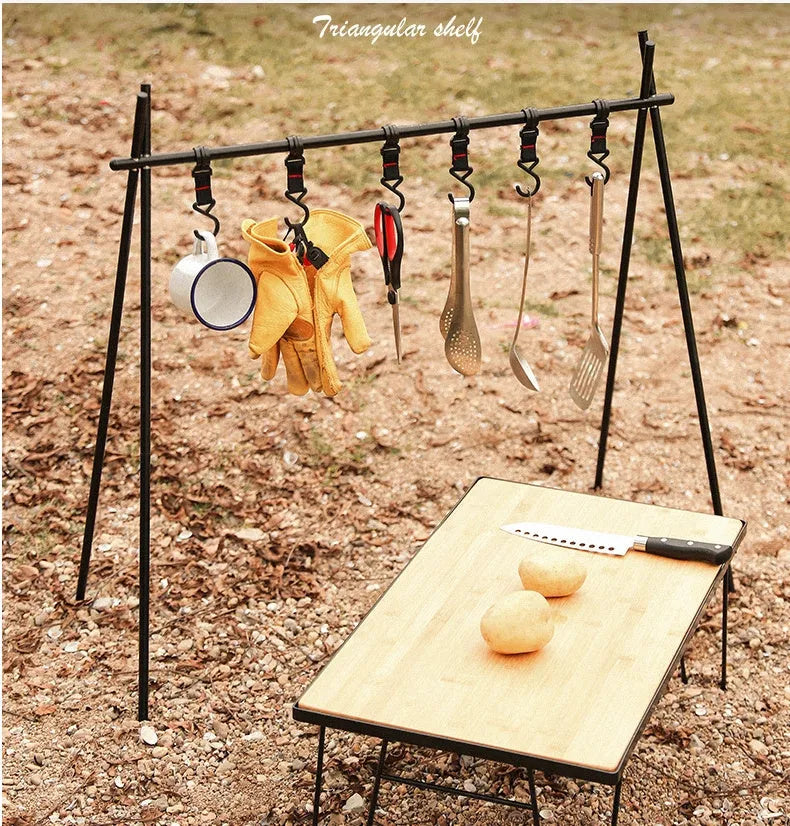 Large silver aluminium foldable triangle camping clothes drying rack with side hanger.