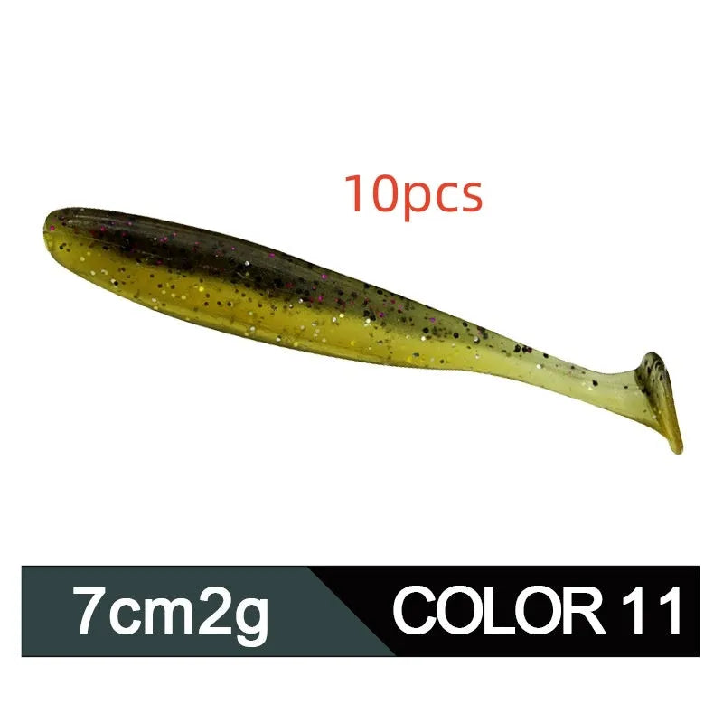 Soft plastic T-tail fishing lure in two-tone mandarin fish pattern, 7cm long.